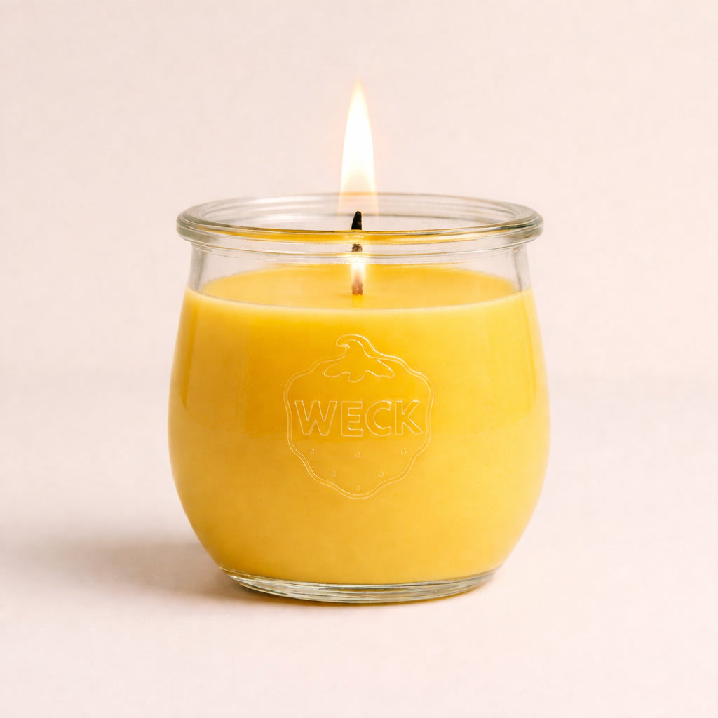 Zitronenduftkerze im WECK-Glas mit heller Flamme neutrales Produktbild