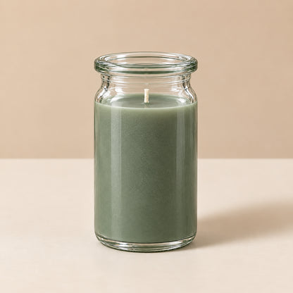 grün-graue kleine Duftkerze aus Kokoswachs im originalen WECK-Glas von CandleDeko, vor neutralem Hintergrund.